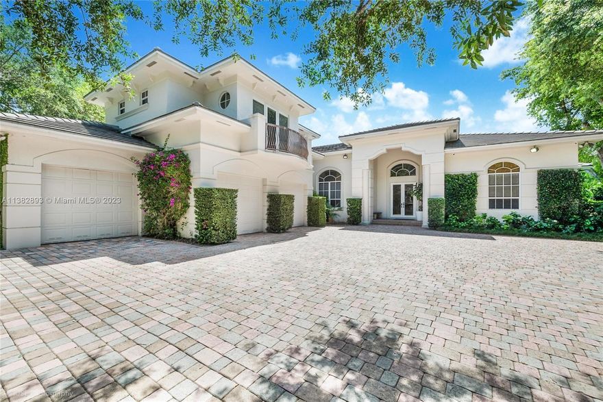 Your memories in this Pinecrest estate home located on a unique winding street will be magical. Spectacular Hollub built gated family estate, meticulously maintained by one owner. Sophisticated spaces embrace the outdoors and Miami family life. Sprawling split floor plan, over 8,000 Sqft, 8 bedrooms (possible 9) 7 full bathrooms, gourmet dream kitchen w/ Dacor and Sub-Zero appliances, overlooking the 2021 new pool, patio, and summer kitchen with motorized screens for covered terrace. Updated primary w/ elegant modern bath and dual closets. Media/game room with bar for entertaining. Generator! Lush landscaped lit lot with treasured orchids scattered amongst the inviting garden. See additional features in attachments. Will be a pleasure to show by appointment!