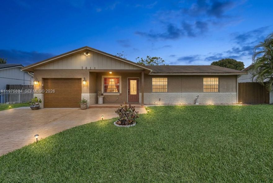 Discover this cozy and charming Home, located in the heart of Lauderhill. Lauderhill offers a vibrant community with a mix of cultural diversity, affordable living, and various amenities. This 4-br/2ba, on a generous 1703 lot is a great opportunity for a 1st time home buyer or investor. The home features a beautiful kitchen with new LG appliances, including an Air Fryer stove.  The 4th bedroom was converted/added to the huge family room and can be easily converted back into the 4th bedroom.  Charming backyard with a beautiful covered patio, ideal for gatherings. Enjoy the backyard, offering plenty of space for outdoor activities, gardening, or relaxation. The built-in bar adds a unique touch for parties and BBQ.  New Hurricane-proof garage and front door.  The city has a rich educational environment with multiple highly rated schools. The cost of living is approximately 10% lower than the Florida average.