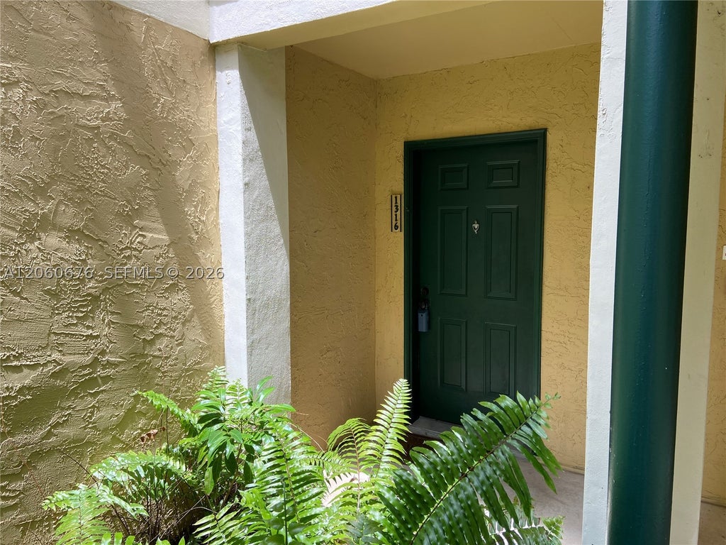 Photo of 755 Riverside Dr #1316, Coral Springs, FL 33071 (MLS # A12060676)