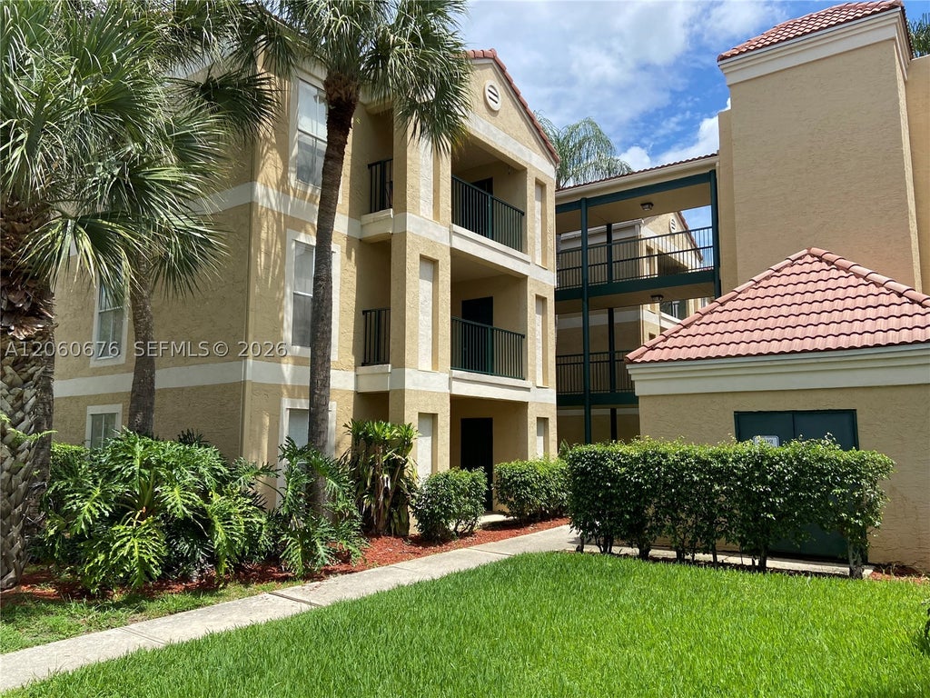 Photo of 755 Riverside Dr #1316, Coral Springs, FL 33071 (MLS # A12060676)