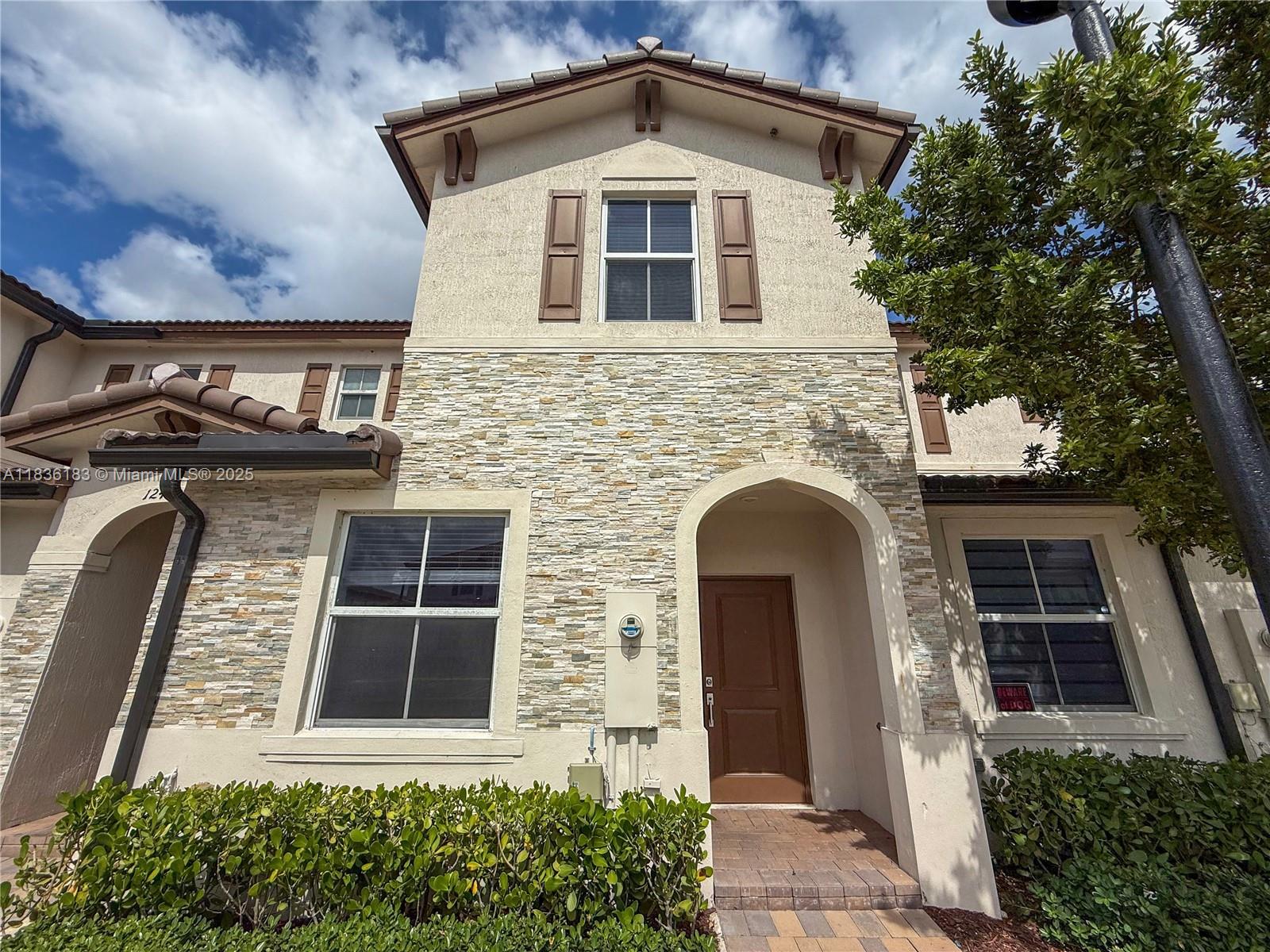 Beautiful Villa crafted by Lennar. This two-story home boasts 3 beds/3 baths with 1bed and 1 bath downstairs, and a large walk-in closet in the Master Bedroom. Enjoy ceramic tile on the first floor, carpet on the second, stainless steel appliances, washer & dryer inside, high impact windows and doors. 4 parking spaces!!!