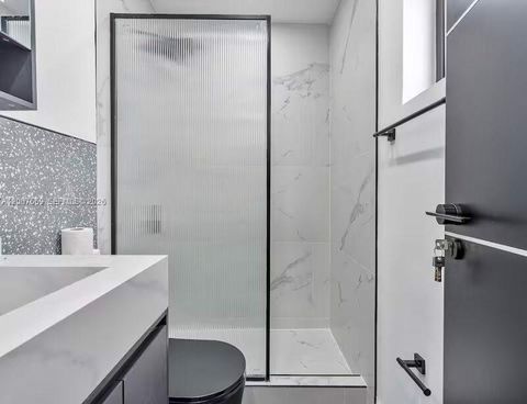 Tiny photo for 400 NW 40th St, Miami, FL 33127 (MLS # A12007569)