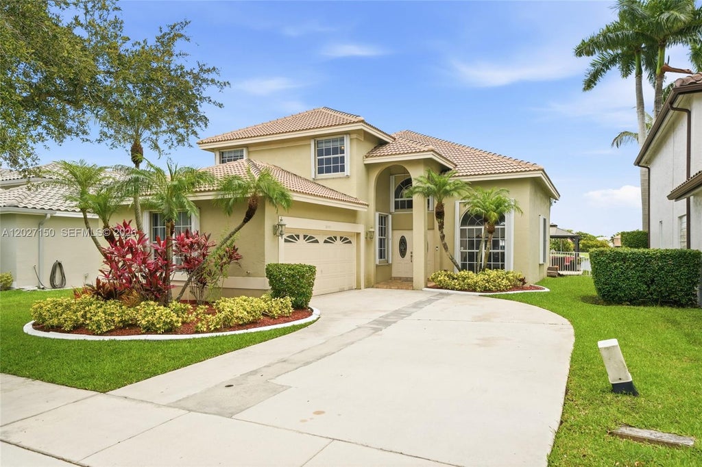 Photo of 18443 NW 13th St, Pembroke Pines, FL 33029 (MLS # A12027150)