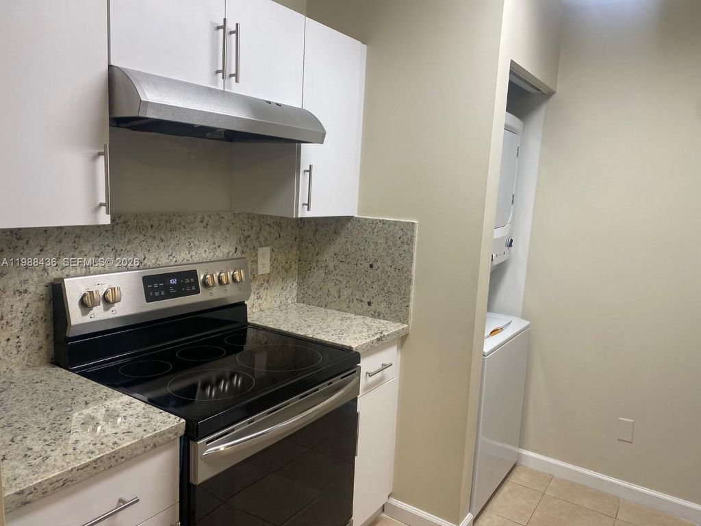 Photo of 1450 SE 3rd Ave #202, Dania Beach, FL 33004 (MLS # A11988436)