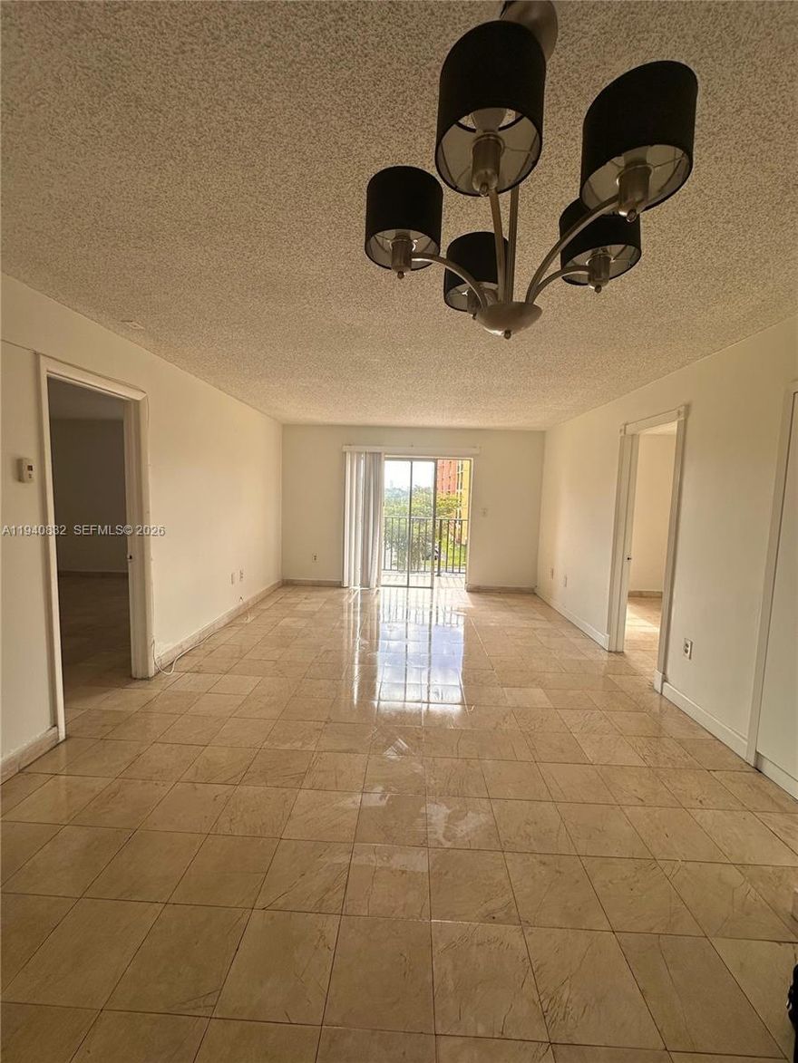 Spacious 2-bedroom, 2-bathroom residence with a dynamic outlook over the Miami Airport skyline. A unique blend of tranquility and urban energy.