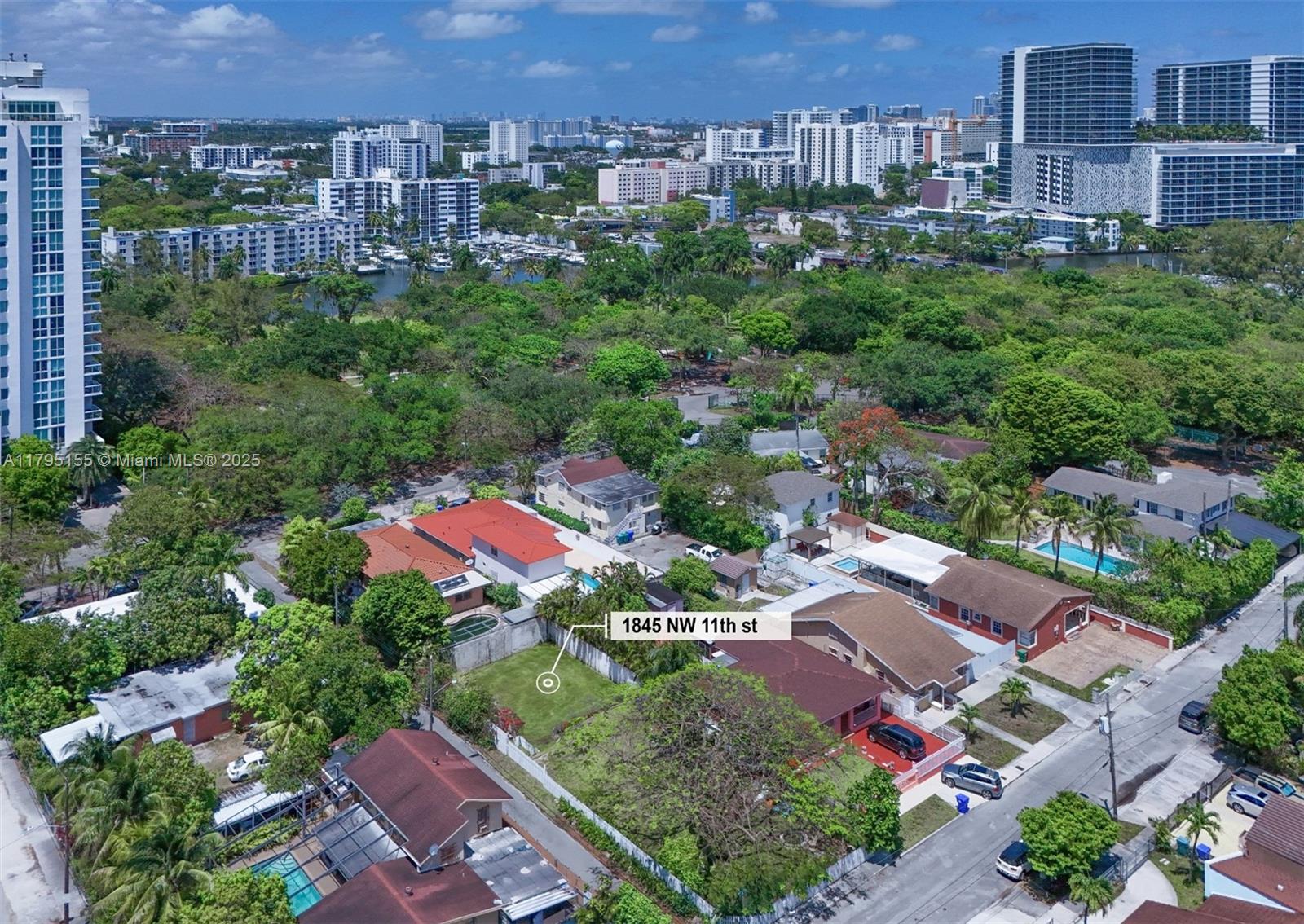 Discover your own slice of paradise in this rare single-family gem—a 6,750 sq ft private, cleared corner lot nestled in the idyllic Miami River neighborhood. Bordering two quiet, no-traffic lanes and just one block from the lush 11-acre Sewell Park, this peaceful haven is framed by a charming white picket fence, vibrant bougainvillea, and a majestic shady poinciana tree—perfect for relaxing afternoons. Utilities are already in place—water, sewer, and electric—so you can start building right away. Embrace the opportunity to continue with the seller’s Key West-style home plans or create your own vision. Unique, affordable, and ready for your dream home!