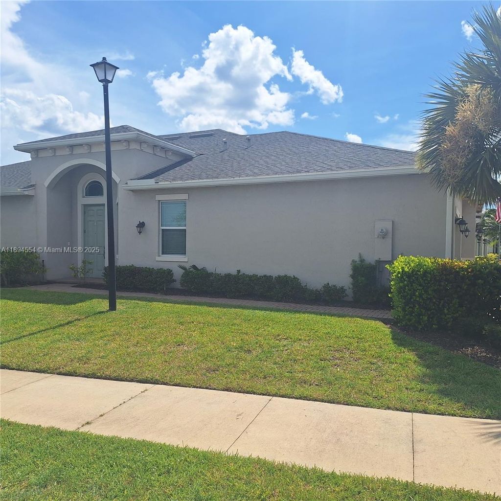 Photo of 11484 SW Lake Park Dr, Port St Lucie, FL 34987 (MLS # A11894554)