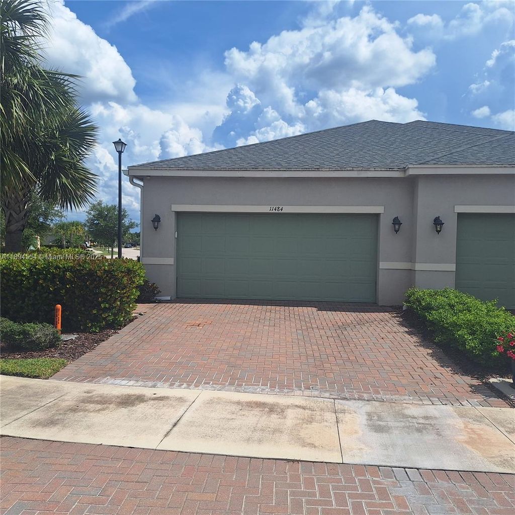 Photo of 11484 SW Lake Park Dr, Port St Lucie, FL 34987 (MLS # A11894554)