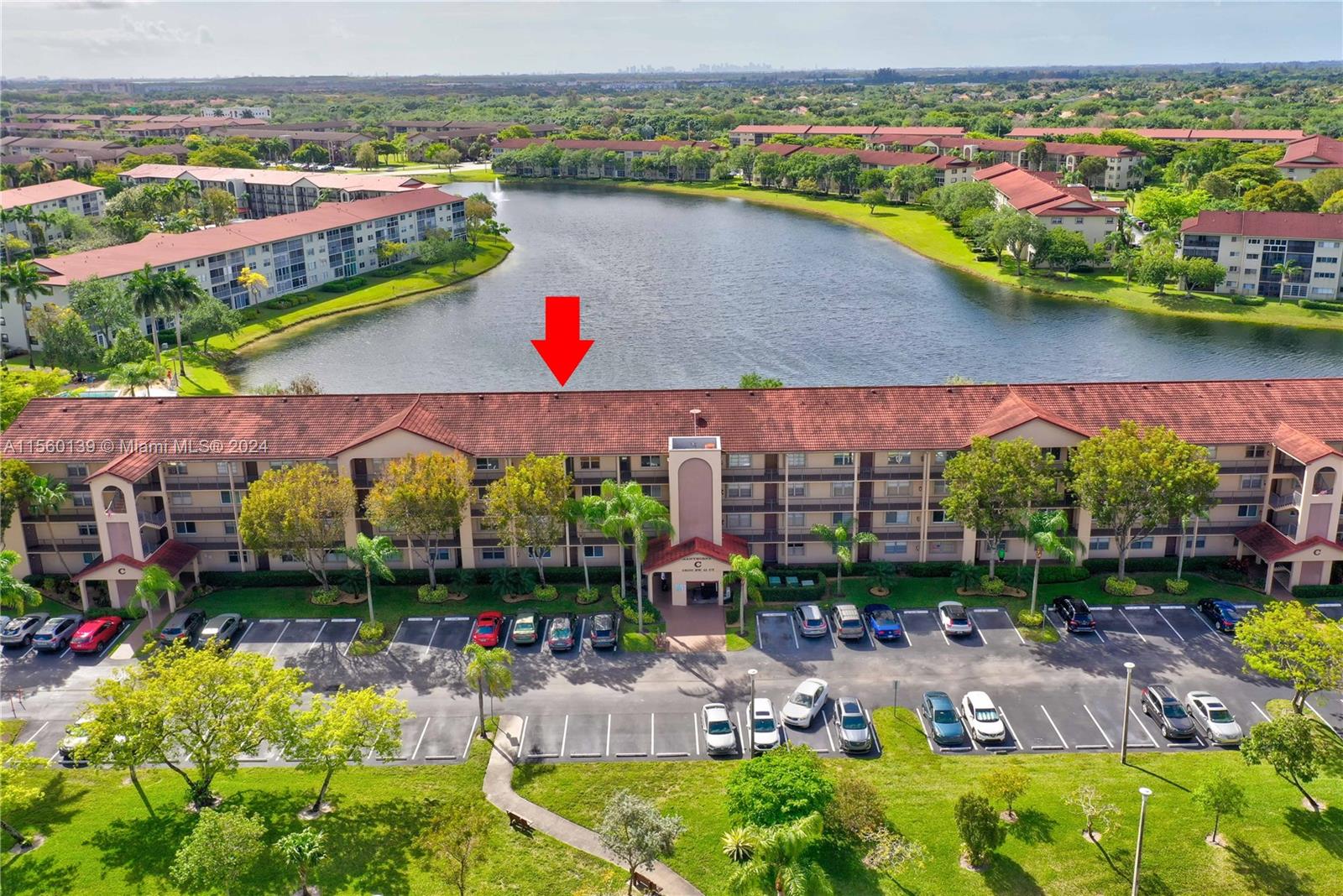 Nestled in one of the most sought after subdivisions. This 2 bedroom 2 bathroom condo boasts a host of desirable features and upgraded kitchen amenities including granite countertops, contemporary cabinets with lazy susan design, pull-out pantry shelving, and deep pots and pans drawers. Stainless steel appliances add a touch of modernity. All tile flooring constantly throughout, while the bathrooms impress with floor-to-ceiling tiling and sleek glass shower doors. Front load washer and dryer. Enjoy the security of hurricane impact windows! Enclosed patio is a perfect place of peace and solitude. Step onto the enclosed patio for a tranquil retreat with breathtaking panoramic views of the lake, offering complete privacy on the top floor without the disturbance of noise from above.