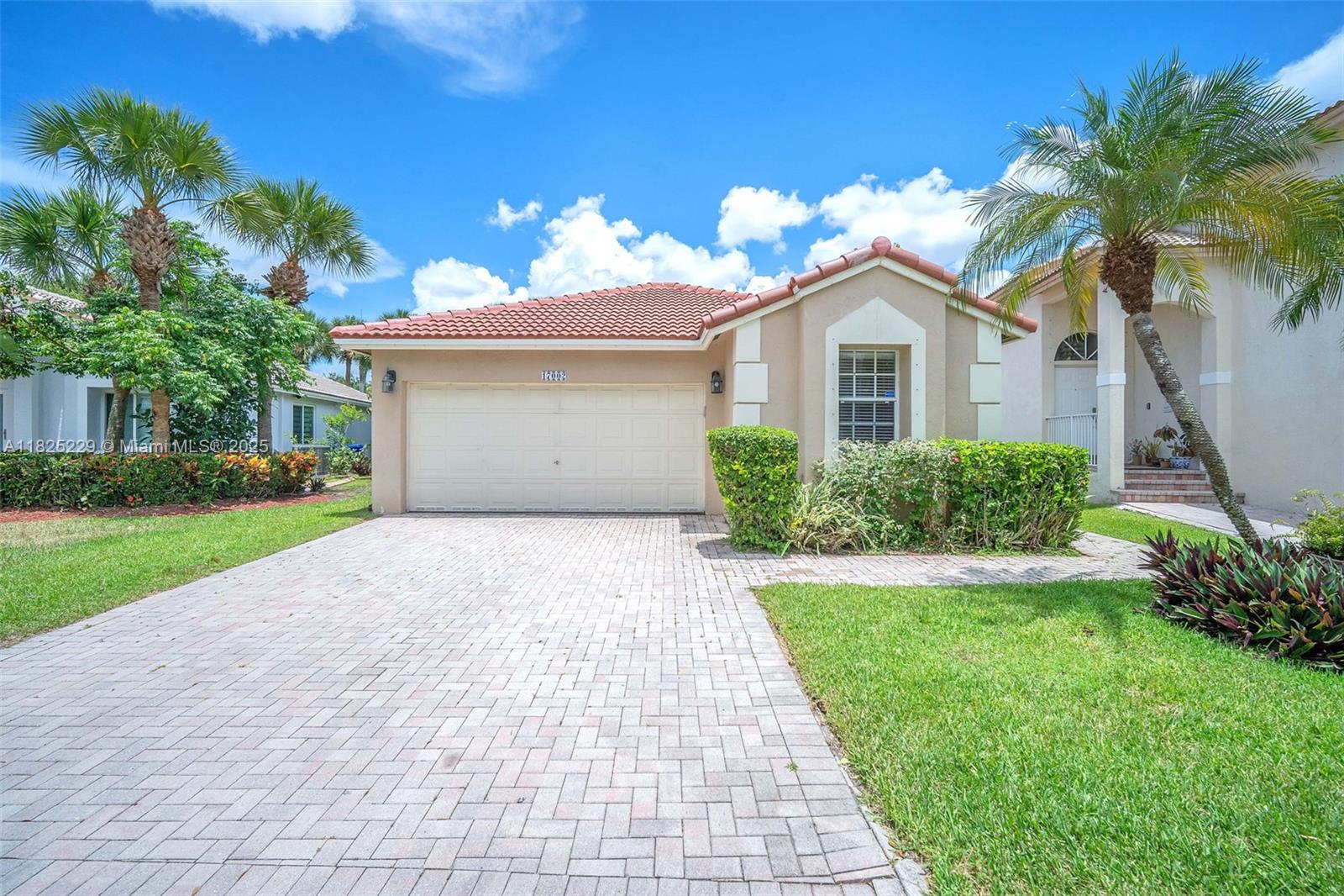 Welcome to this spacious 3-bedroom, 2-bath, 2 car garage, and screen enclosed patio home located in a peaceful resort-style gated community. Enjoy access to exclusive amenities of this well maintained and sought after neighborhood, with three swimming pools, tennis courts, soccer field, gym, basketball courts, fishing dock, volleyball court, children playground, yoga room, and more. In addition, guest parking spaces are located directly across from the home, making it easy and convenient for family and friends to find available parking.