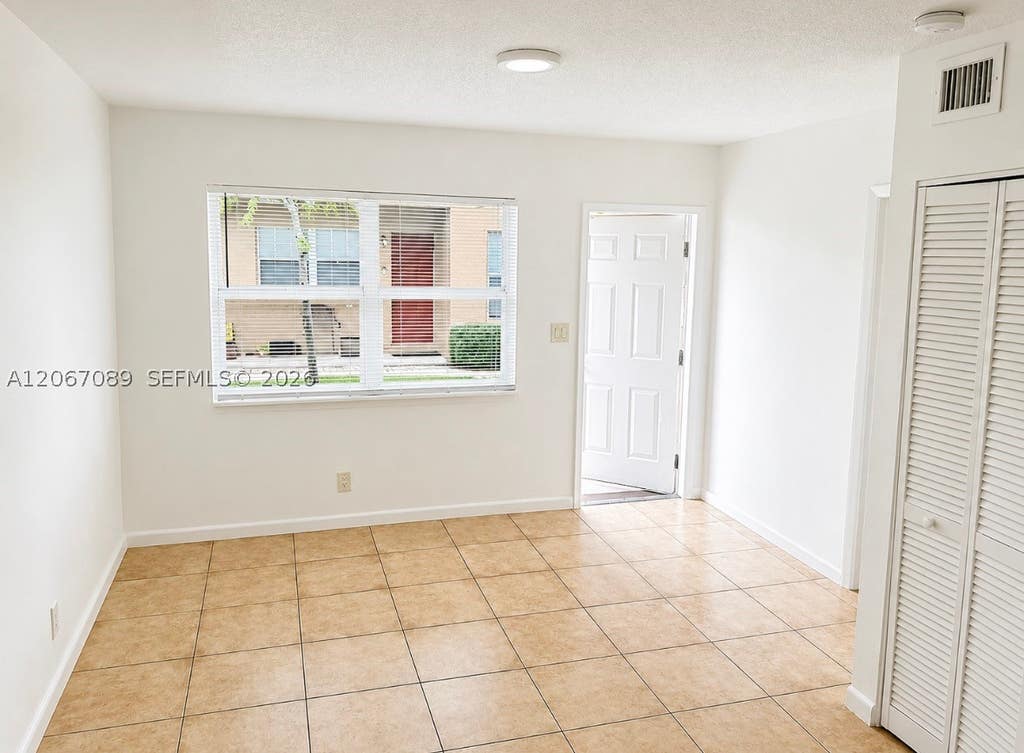 Photo of 272 SW 3rd St #A-D, Deerfield Beach, FL 33441 (MLS # A12067089)