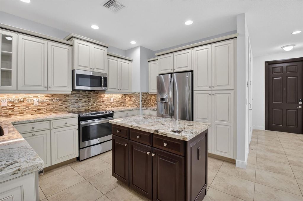 Photo of 16177 Poppyseed Cir #503, Delray Beach, FL 33484 (MLS # A11954376)