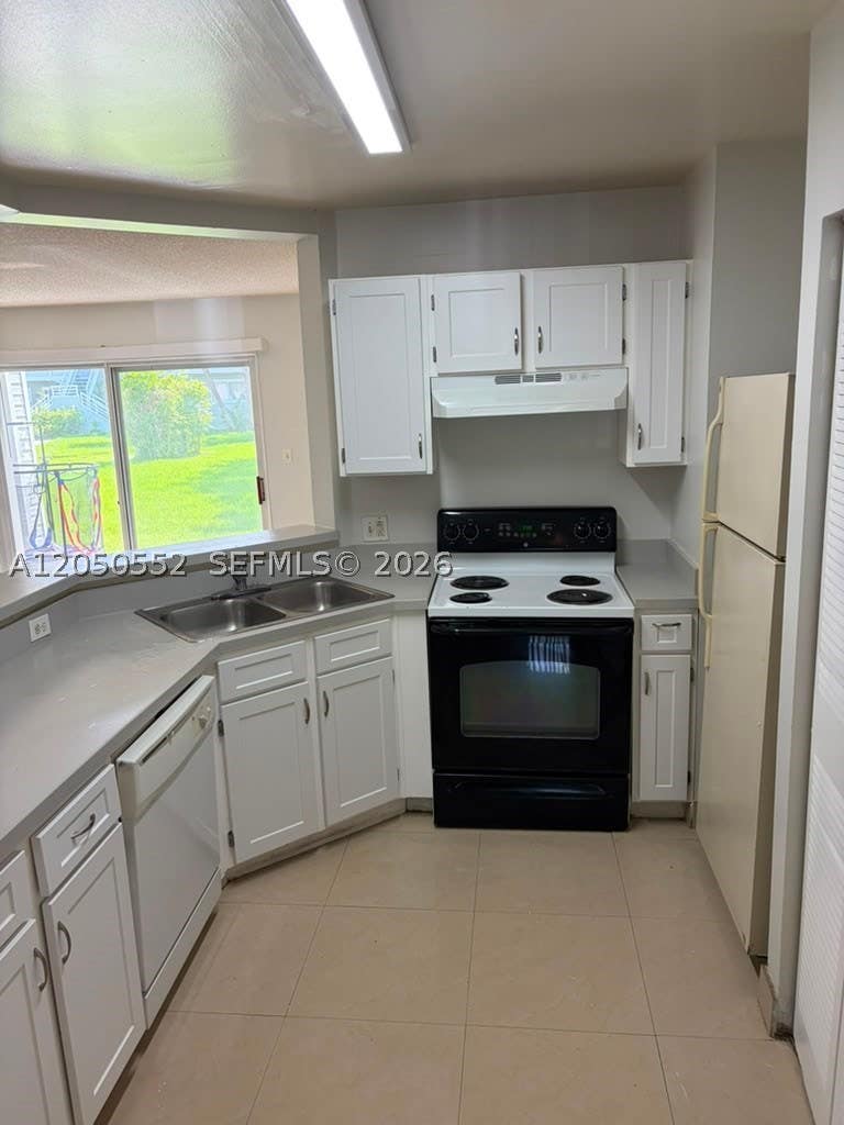 Photo of 3461 NW 44th St #102, Oakland Park, FL 33309 (MLS # A12050552)