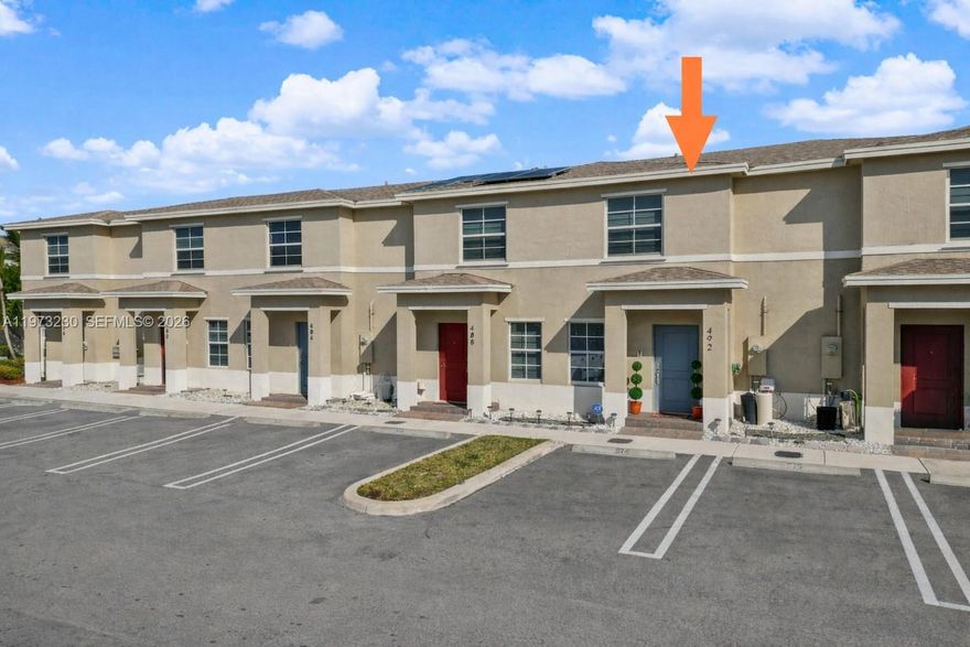 Welcome to this immaculately kept, modern 2-bedroom, 2.5-bath corner townhome built in 2022, located in the highly desirable Keys Pointe community. This stunning home offers a bright and open layout with tile flooring on the first floor and a stylish eat-in kitchen featuring stainless steel appliances, quartz countertops, and a built-in pantry for added convenience. Enjoy the functionality of a built-in office closet, recess lighting throughout, tankless water heater, and whole-house water softener with reverse osmosis system—a rare and valuable upgrade. Upstairs, you'll find two spacious primary bedrooms, each with its own private bathroom. The remodeled master bath features modern finishes and an upgraded toilet, while both bedrooms offer custom built-in closets and soft carpeted flooring for maximum comfort. Step outside to your fully fenced, completely paved backyard, perfect for relaxing or entertaining. A storage shed adds extra utility, and the home includes two assigned parking spaces right out front. The community offers fantastic amenities including a sparkling pool, playground, green spaces, and recreation areas. Ideally located near shopping, dining, schools, and major commuter routes, this home is perfect for both homeowners and investors alike.