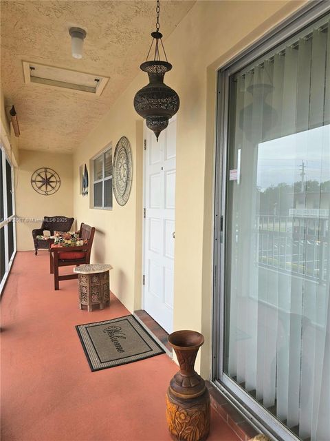 Photo of 5387 SW 40th Ave #203, Dania Beach, FL 33314 (MLS # A11882007)