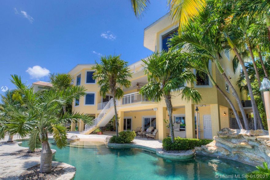 Oceanfront Elegance on the Cay! Ocean Cay is a premier gated community, an enclave of oceanfront homes sought after for their protected deep-water dockage. Upon entering the commanding residence, soaring ceilings and the open design only serve to enhance the ocean vistas. Four large bedrooms, four and a half baths, and a beautifully Bali-themed secondary living area. Expansive home theatre/media room plus a temperature-controlled wine room to delight any wine connoisseur. The chef's kitchen includes stainless steel appliances, a central island, and a sit-up counter, all with the utmost in finishes and ideally located adjacent to the formal dining area and Great Room. The unique wrought-iron staircase to the main level leads to the main bedroom with a walk-in closet.