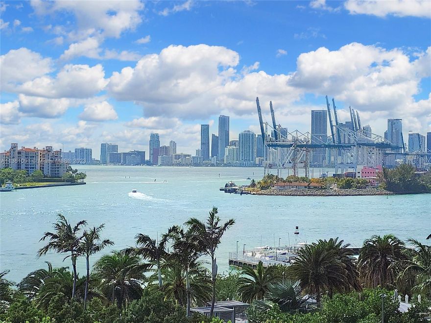 Rare Find! Owner Financing Available! Step thru the double door entry into a magnificent foyer with views that will take your breath away. Highly sought after 03 Line, with stunning open views to Biscayne Bay, Ocean and City. Floor to ceiling windows fill the rooms with Florida sunshine by day and dramatic evening Sunsets at dusk. Watch  the Cruise Ships go by, never ending entertainment! 2 balconies, 3 Bedrooms, 2 1/2 Baths in beautiful Portofino. Walk to everything Miami Beach has to offer.