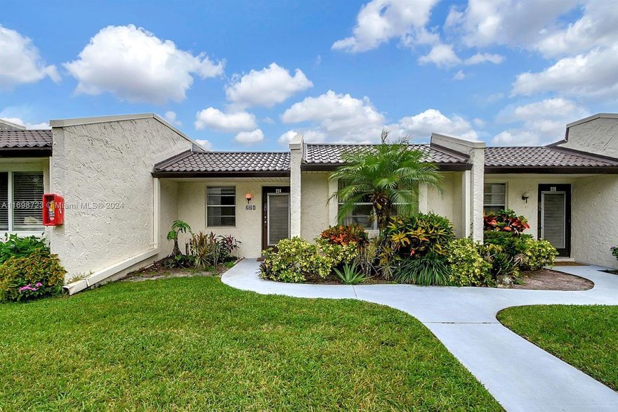 Located in the vibrant 55+ community of Golden Lakes Village, this delightful villa in WPB offers comfort & convenience. Featuring a spacious kitchen, sleek tile flooring, a full-size washer/dryer, & calming water views from the large screened patio, this home is perfect for relaxed living. Enjoy resort-style amenities, including a cafe, sauna, hot tub, courts for pickleball & tennis, fitness room plus an active social calendar with movies, shows and activities supervised by a full-time Lifestyle Director. The maintenance fee covers cable, internet, water, building insurance, a courtesy bus for twice-weekly grocery runs, etc. With 24/7 security & proximity to downtown, shopping, & more, this villa is minutes from everything you need. One occupant must be 55+. Don’t miss this opportunity!