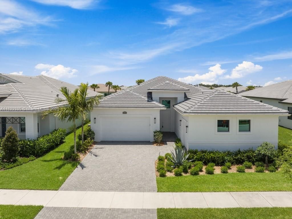 Photo of 9125 SW Esule Way, Port St Lucie, FL 34987 (MLS # A11822335)