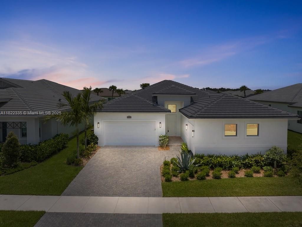 Photo of 9125 SW Esule Way, Port St Lucie, FL 34987 (MLS # A11822335)