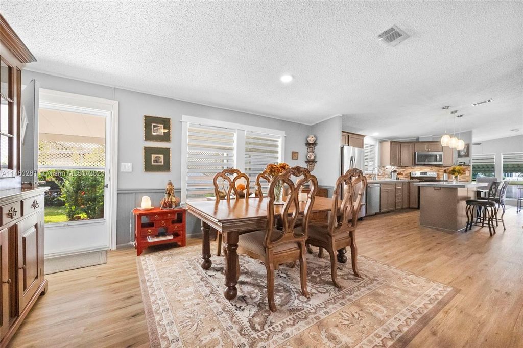 Photo of 7056 SE Birchwood Ln, Stuart, FL 34997 (MLS # A11480281)