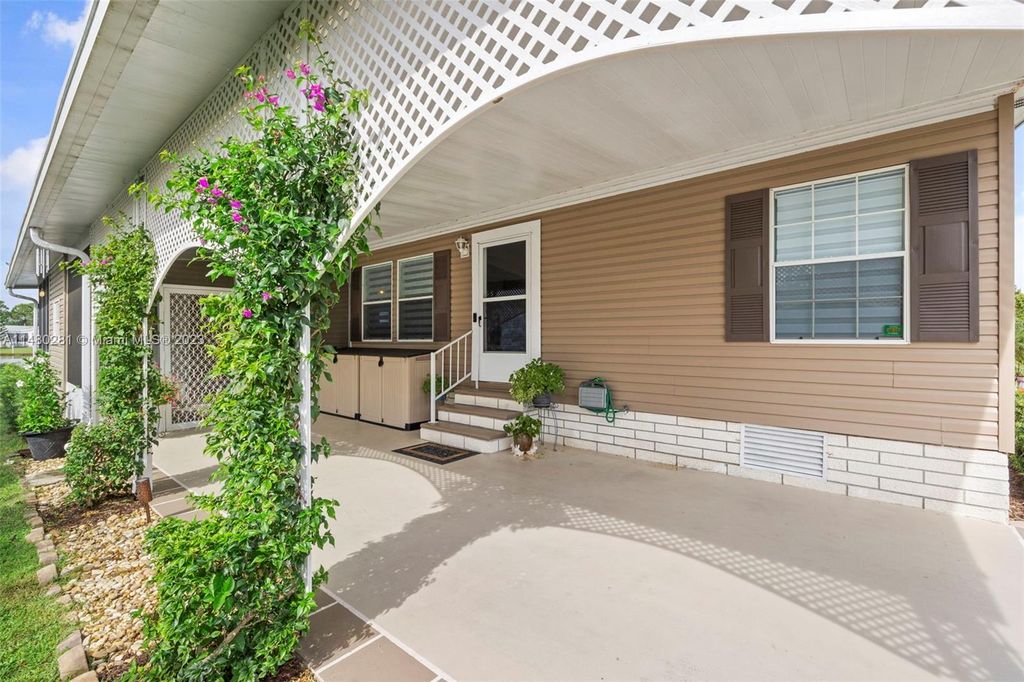 Photo of 7056 SE Birchwood Ln, Stuart, FL 34997 (MLS # A11480281)