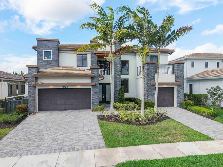 Welcome to The Victoria in Cascata, Parkland's Premier Gated Community. This stunning two-story residence offers 6 bedrooms, a den, a spacious loft, and 7 bathrooms. The main living area impresses with soaring 20-foot ceilings and abundant natural light, seamlessly connecting the formal living room, family room, game room, and den. All opening to a terrace perfect for indoor-outdoor living. The gourmet kitchen features premium stainless steel appliances, upgraded European cabinetry, and generous counter space, ideal for hosting and daily use alike. Designer finishes throughout include upgraded flooring, European wall coverings, and custom luxury light fixtures. Ample storage and a highly functional layout make this home as practical as it is beautiful.
The first-floor primary suite is a true retreat, offering direct backyard access, coffered ceilings, two walk-in closets, and a spa-inspired bath with a jetted Roman tub and dual-head shower. Upstairs, five additional bedrooms and an oversized loft provide flexible space for guests, a home office, or leisure. The expansive backyard offers a terrace with ample room to add a custom pool. A private outdoor haven to enjoy South Florida living year-round. Smart home-ready infrastructure allows seamless integration of modern technology throughout. Situated on a corner lot, larger than standard. Furniture is not included but is negotiable.