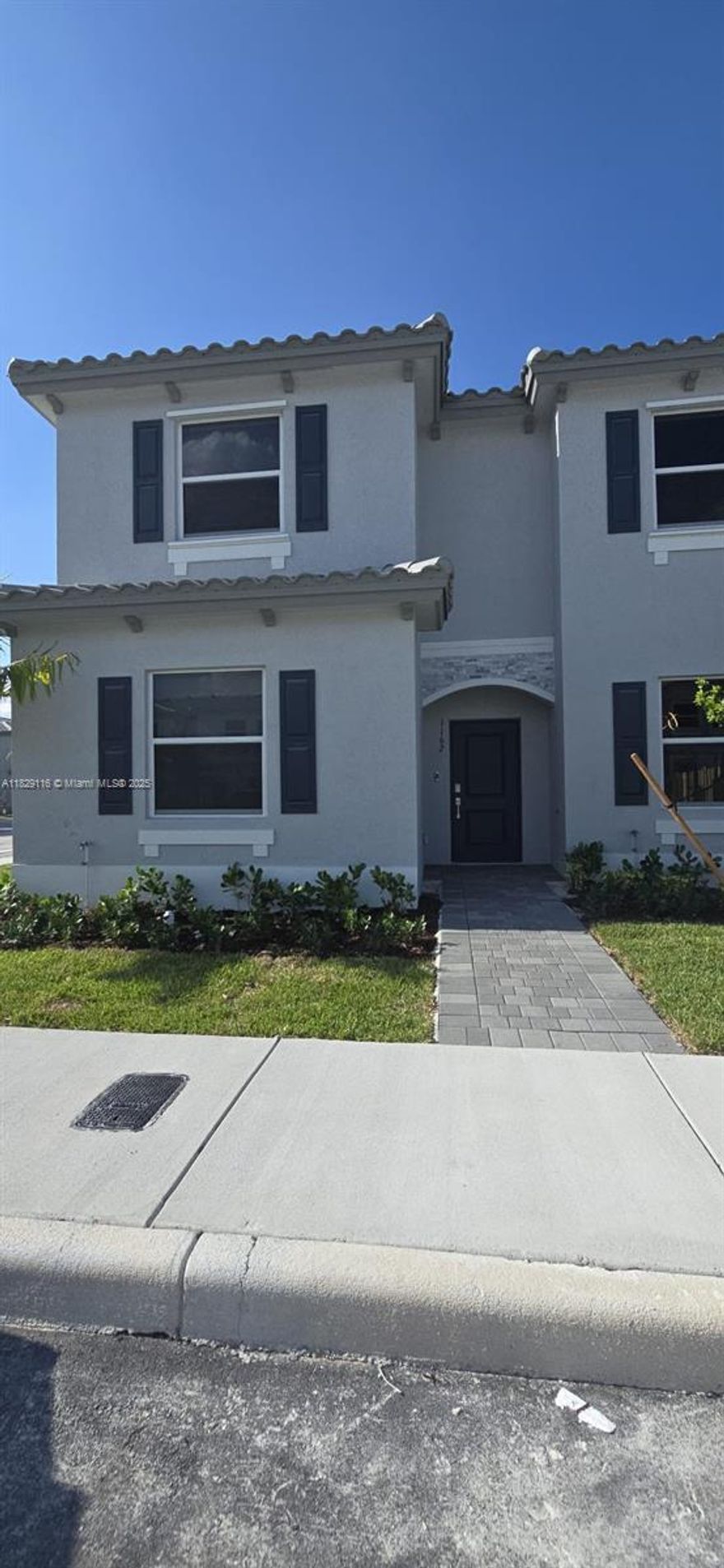 Beautiful 2-Level Corner Townhouse 3/3 - 1st floor features a private bedroom & full bath—perfect for elderly residents. Enjoy a sleek, open-concept kitchen with brand new appliances, a convenient W&D area, cozy patio ideal for weekend BBQs. Upstairs oversized master suite with large walk-in closet and elegant en-suite bathroom. A 3rd bedroom, full bath, and a linen storage area round out the second level. This smart home includes high-speed internet/WiFi, an electronic entrance door, and a smart doorbell system. Include 2 assigned parking spaces. Owner install new W&D, Curtains, Lamps, Toilet paper/Bath towells hanger. Upcoming amenities such as a community pool, fitness, club house. Located in a safe, east-of-US1 neighborhood, right across from a brand-new Publix within walking distance.