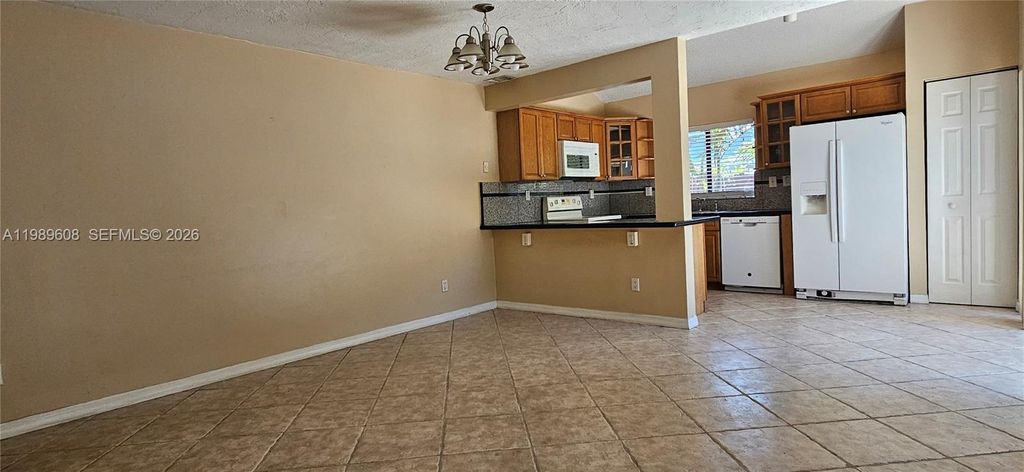 Photo of 610 Commodore Dr, Plantation, FL 33325 (MLS # A11989608)