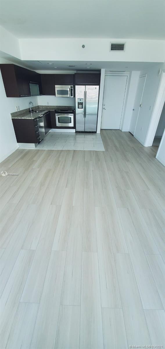 THE PLAZA 851 BRICKELL CO - Residential Lease