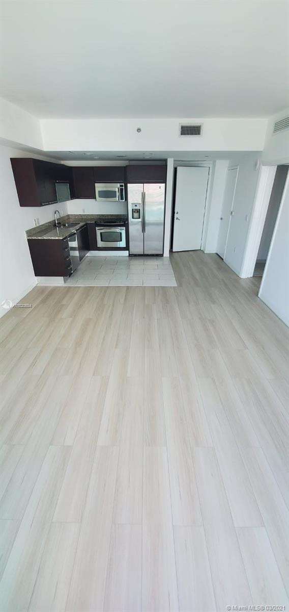 THE PLAZA 851 BRICKELL CO - Residential Lease