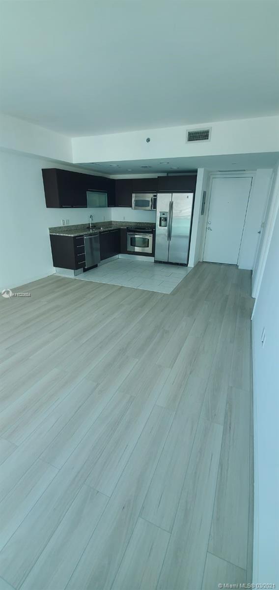 THE PLAZA 851 BRICKELL CO - Residential Lease