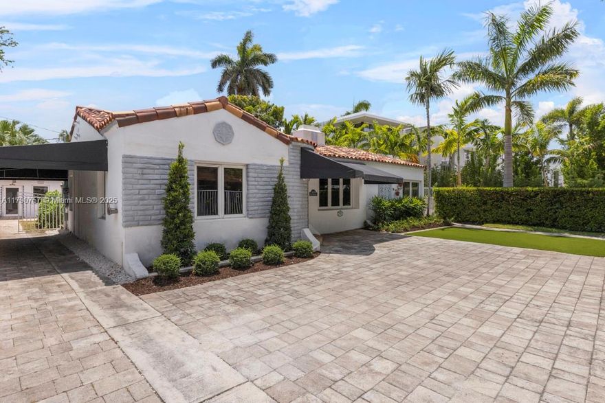 Welcome to 1050 W 47th St, Miami Beach, FL 33140! Nestled in a prime location, this beautiful home boasts 4 spacious bedrooms and 3 bathrooms across 1,996 sq ft. Built in 1937, the residence has historical charm. The interior dazzles with elegant hardwood and tile flooring and granite countertops, creating an inviting atmosphere for family gatherings and entertaining. Outside, a large garden awaits with mango and banana trees offering a serene escape and endless possibilities for outdoor enjoyment. The garage has been converted into a 1br unit for rental use. With fully approved plans for new construction, this property also presents a unique opportunity to build your dream home.