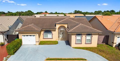 Photo of 8761 NW 142nd St, Miami Lakes, FL 33018 (MLS # A11911881)