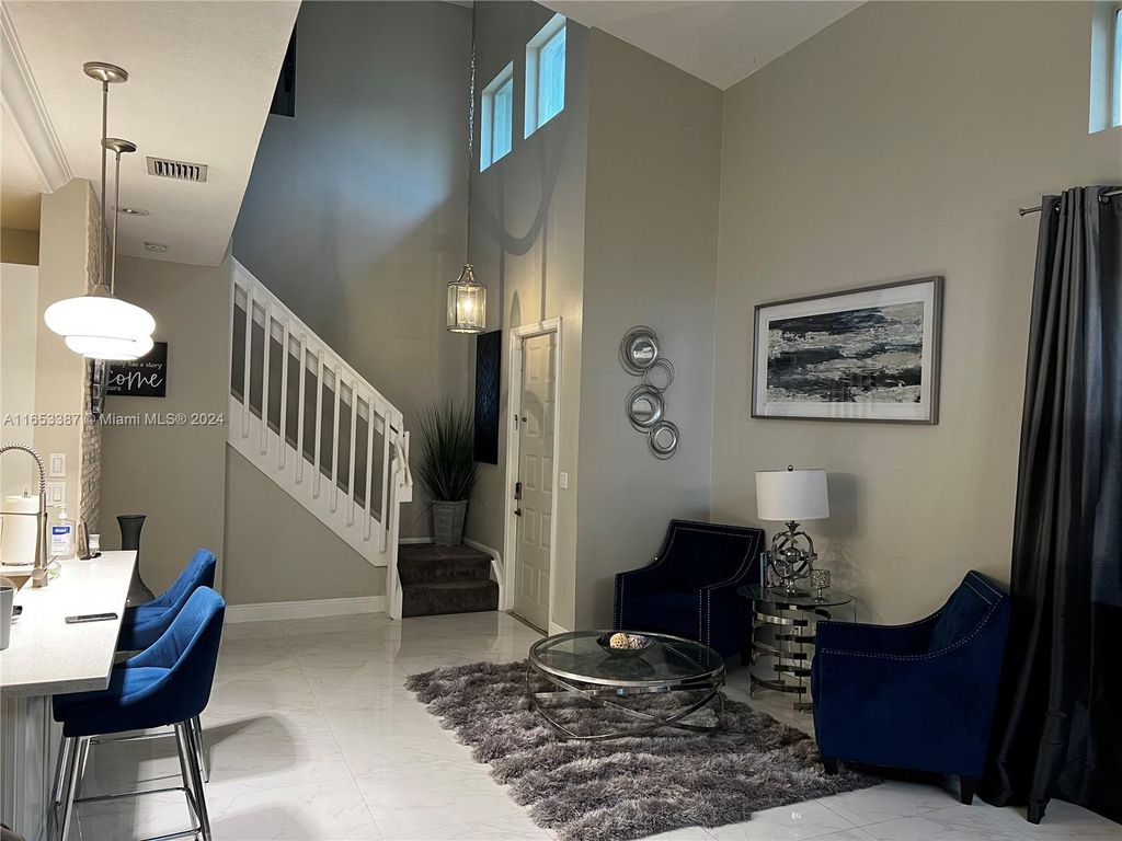 Photo of 12591 NW 57th Pl, Coral Springs, FL 33076 (MLS # A11653387)