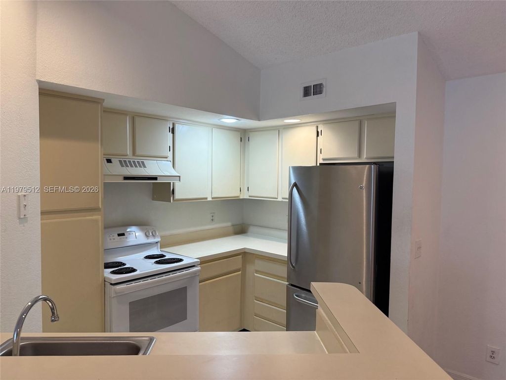 Photo of 13090 Vista Isles Dr #126, Sunrise, FL 33325 (MLS # A11979512)