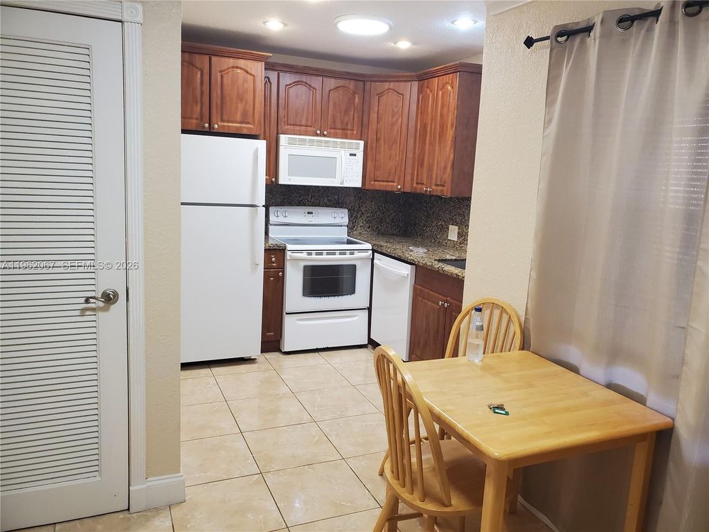 Photo of 1300 Moffett St #109, Hallandale Beach, FL 33009 (MLS # A11962067)