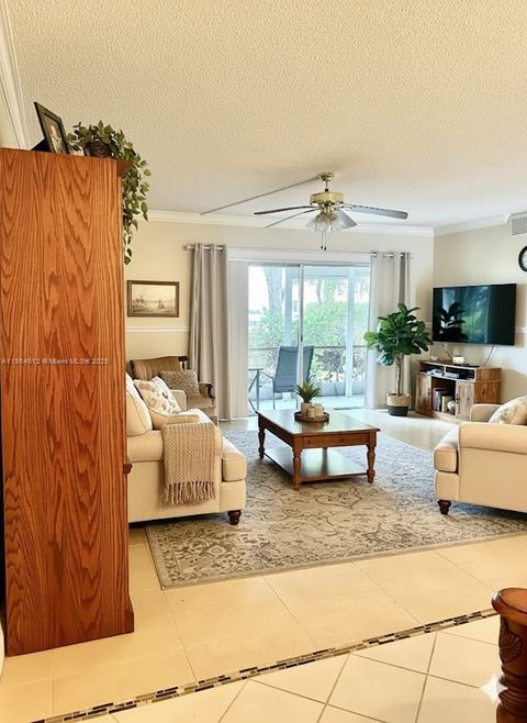 Photo of 111 S Hollybrook Dr #107, Pembroke Pines, FL 33025 (MLS # A11864612)