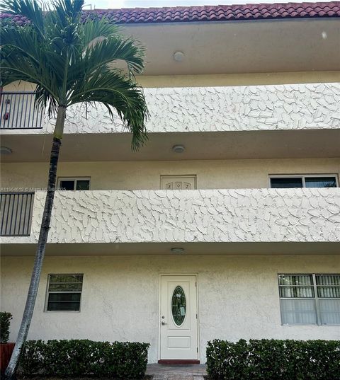 Photo of 111 S Hollybrook Dr #107, Pembroke Pines, FL 33025 (MLS # A11864612)