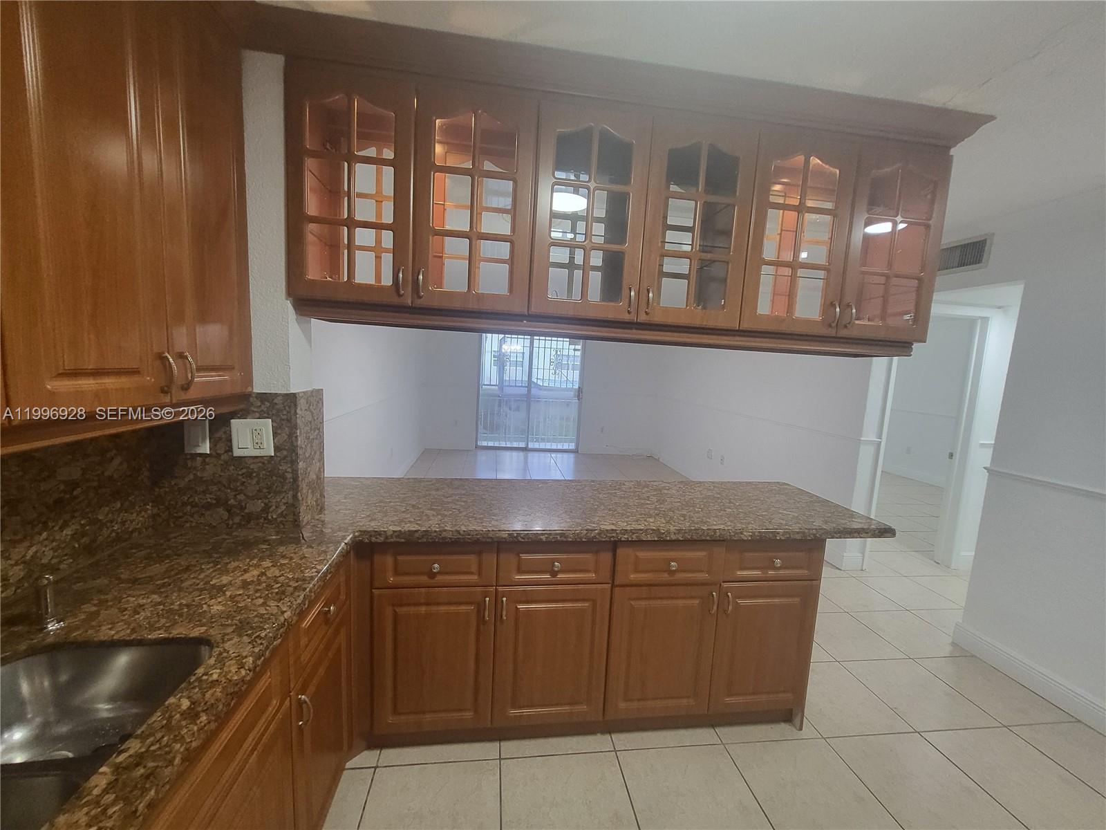 COURTYARDS OF HIALEAH CON - Residential Lease