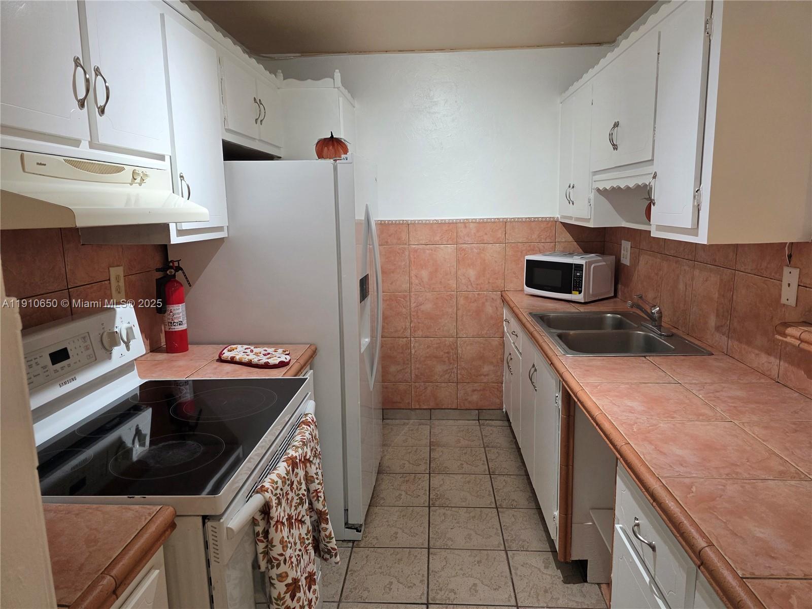 KENDALL ACRES CONDO BLDG - Residential Lease