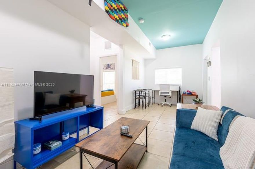 A fully furnished and exceedingly convenient location await you, just bring your suitcase and settle right in!  This 2/1 apartment-style rear unit boasts a full suite of kitchen and laundry amenities, and is the perfect, secure, efficient, and cozy home to relax in.  Easy access to I95 comes standard, or take the causeway directly to Miami Beach, and with dining, nightlife, and retail within only blocks, this home is ready for you with every modern convenience and in the perfect location for both work and play!  Full impact windows offer peace and energy efficiency, and with downtown, Brickell, and Wynwood a short drive even in traffic, you can rest comfortably and enjoy comfortably without a long commute.  Need a shorter term?  Just ask!  Call Daniel today for a private tour!