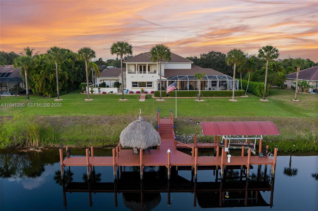 Photo of 2618 SW River Shore Dr, Port St Lucie, FL 34984 (MLS # A11941280)