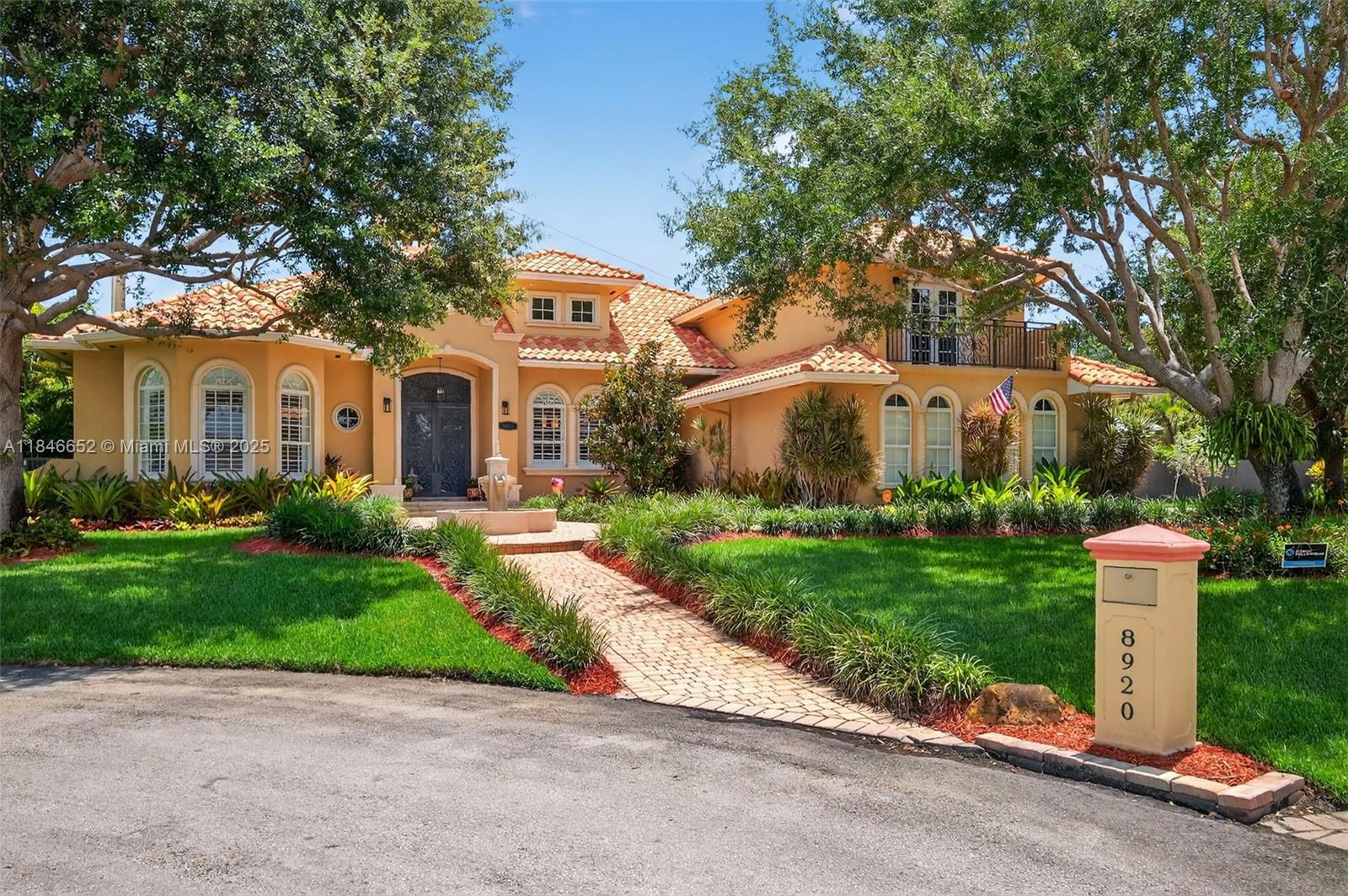 Pristine and luxurious this 6BR/5BA canal-front custom home on private cul-de-sac will impress the most discerning Buyer. Beautiful entry w/ water fountain, huge french doors, marble floors, & formal living w/ fireplace. Enjoy newer chef’s kitchen w/top-tier appliances & oversized island looking out to gorgeous pool. Retire to your master suite with spa bath, digital shower, jacuzzi, and large dual California closets. Huge upstairs flex suite, resurfaced resort style pool, Kohler generator, & lush landscaping. This home is great for entertaining with long driveway & huge turnaround w/ 3 car garage. Over 9 fruit trees and vegetable planters have been planted carefully on over 1/2 acre. Built in 2008 you will appreciate lower costs on insurance. Meticulously maintained and move-in ready.