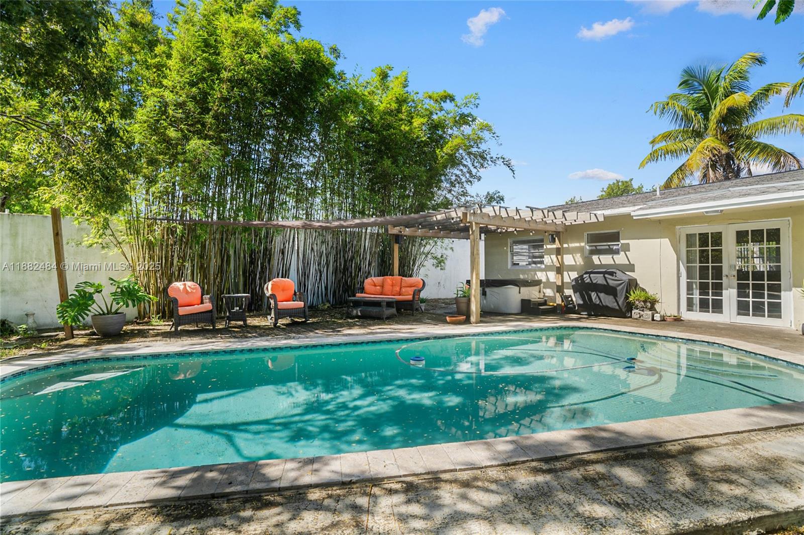 Welcome to this charming 3-bedroom, 2-bathroom home located in Pompano Beach. Featuring approximately 1,381 sq ft of living space on a nearly 7,000 sq ft lot, this residence offers a bright and open floor plan filled with natural light, a kitchen with real wood cabinets, and a private pool perfect for relaxing or entertaining. Built in 1972, the home combines classic character with modern comfort and provides ample outdoor space for gatherings. Nestled in a desirable East Pompano location, it’s conveniently close to shopping, dining, parks, and schools, making it an ideal choice for families or anyone looking to enjoy the best of South Florida living.