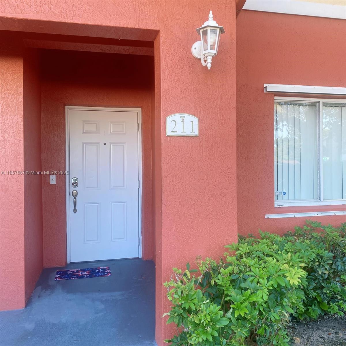 This stunning townhouse in a gated community features 3 bedrooms, 2 bathrooms, back patio, 1 car garage plus driveway, and additional parking for guests. The interior is very spacious, open design concept has laminated wood, and the kitchen features granite countertops and SS appliances, high ceilings, and hurricane shutters. The unit comes pre wired for cable and surveillance. The community offers a clubhouse, playground, and pool. Perfect location near Memorial Hospital, Universities, Hard Rock Cafe, highways and shopping.