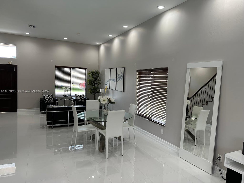 Photo of 10228 SW 23rd Ct #10228, Miramar, FL 33025 (MLS # A11678180)