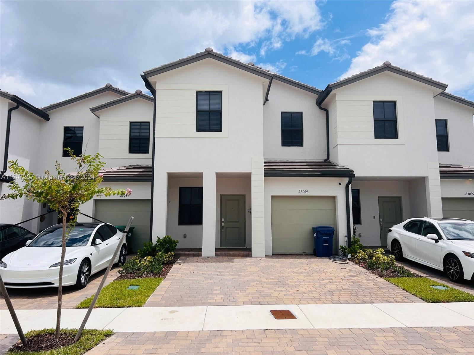 Fantastic NEWLY BUILT Lennar Fee Simple Townhouse in the Siena Reserve featuring a modern open- minimalist concept kitchen, four bedrooms, 2 1/2 baths, second floor with new carpet, living room, dining and family rooms, new stainless-steel appliances, plenty of storage, with a spacious backyard for family enjoyment. Brand new washer - dryer combo, water filter and softener, ADT Home Security system, CATV camera system and modern window shades already installed. Enjoy the club and pool or all of the different hot spots and beaches closely located to this new neighborhood.