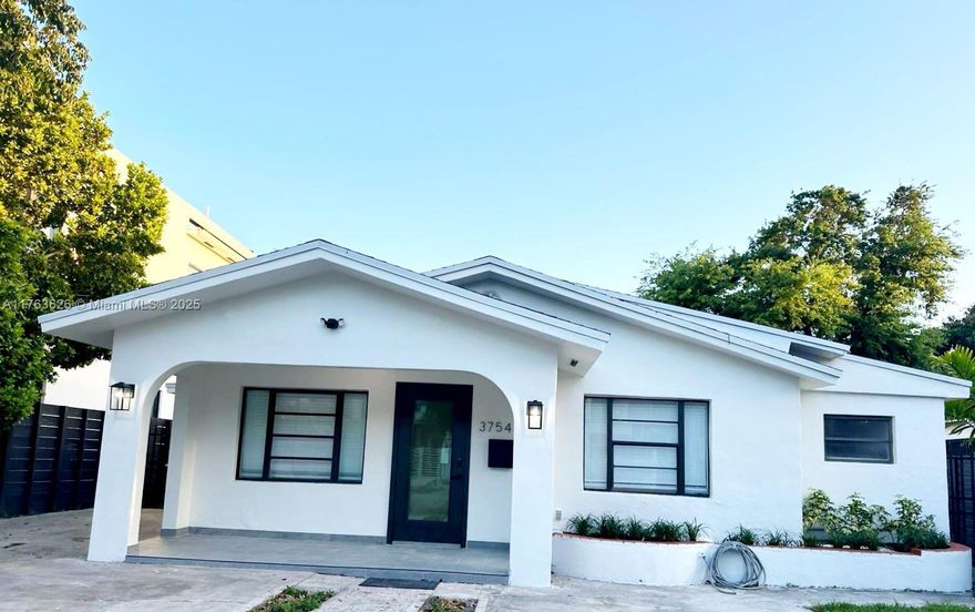 Beautifully renovated 3 bed, 3 bath single-family home on a multifamily-zoned lot just half a block from Coral Gables. Features include new roof (2024), new floors throughout, freshly painted interior/exterior, updated kitchen with new appliances, modern bathrooms with glass doors and double shower in primary suite, new washer/dryer in each unit, and new landscaping. Currently divided into two income-producing units (2/2 and 1/1), both rented. Zoned for multifamily use with excellent potential to build luxury townhomes or redevelop. Located in a high-growth area surrounded by new construction and luxury homes. Just 15 minutes from Miami Intl Airport and Brickell. Close to Coral Gables, Coconut Grove, shops, dining, and top-rated schools.