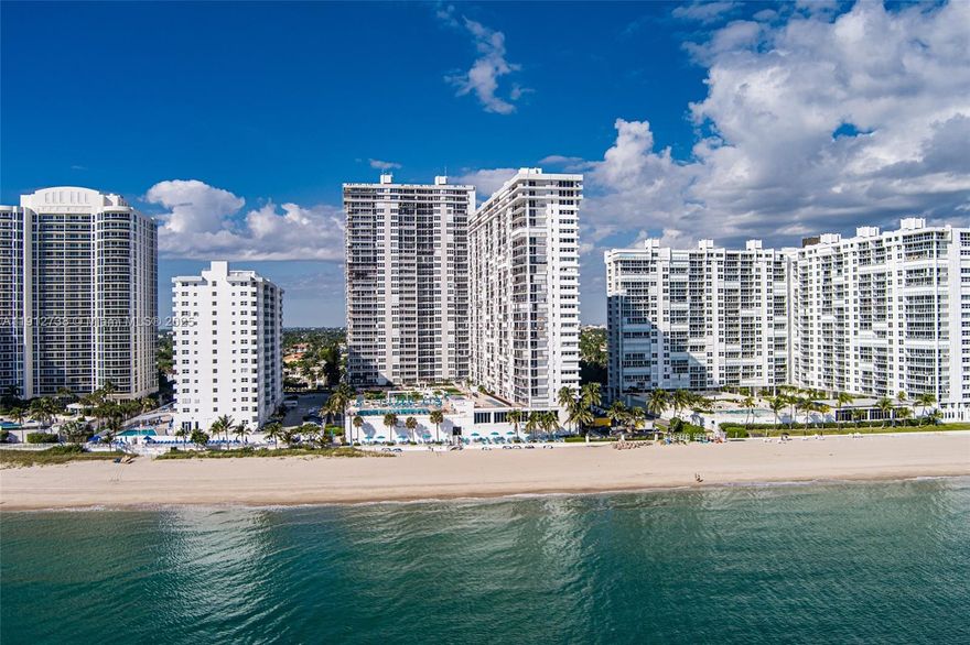 ALL IMPACT WINDOWS AND DOORS ALREADY INSTALLED. Beachfront luxury! This oversized 3 bed, 2.5 bath corner unit boasts 2,600 sq ft—One of the largest in the building, with direct ocean and intracoastal views from east, west, and north. Enjoy stunning sunrises and sunsets from your wraparound balcony. Spacious rooms, impact windows/doors, washer/dryer in unit, and abundant closet space offer comfort and convenience. Semi-private elevator adds exclusivity. Amenities include 24-hour doorman, heated saltwater pool, BBQs, fitness center, saunas, and ocean front community room. Steps from shopping, dining, and entertainment. Live the dream and let the sound of the waves welcome you home.